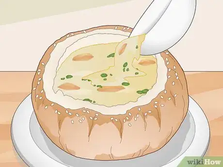 Image titled Eat Soup Served in a Bread Bowl Step 7