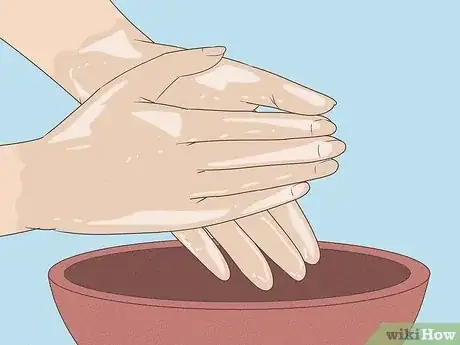 Image titled Remove Garlic Smell from Your Hands Step 1