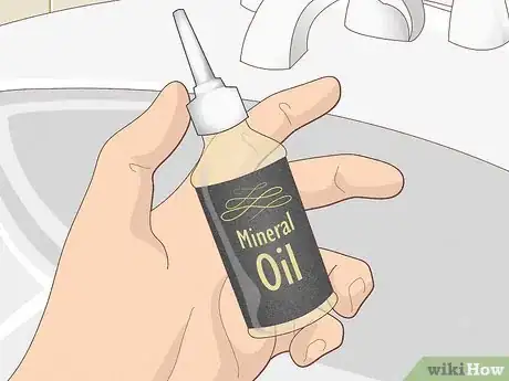 Image titled Apply Oil to an Electric Shaver Step 4