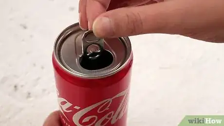 Image titled Do the Soda Can Magic Trick Step 8