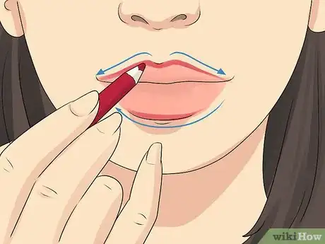 Image titled Keep Lipstick off your Teeth Step 2