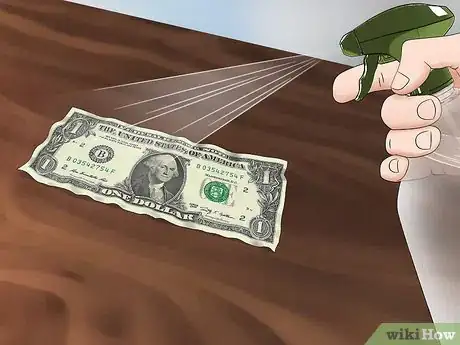 Image titled Straighten Out a Dollar Bill Step 2