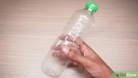 Image titled Do the Water Bottle Flipping Challenge Step 1