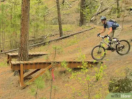 Image titled Ride Off a Drop on a Mountain Bike Step 2