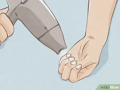 Image titled Dry Your Painted Nails Quickly Step 10