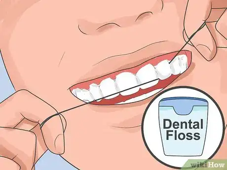 Image titled Pick Your Teeth Without a Toothpick Step 1