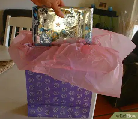 Image titled Slide gift into bag Step 3