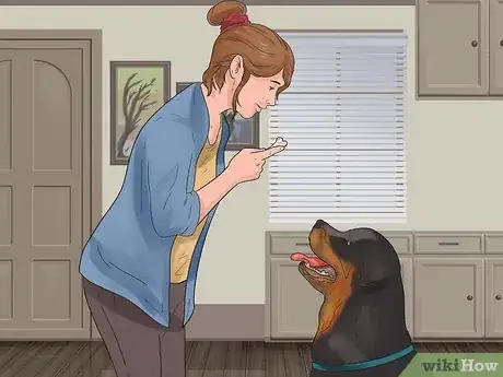 Image titled Teach Your Dog Tricks Step 3