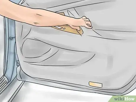 Image titled Get out of a Car Gracefully Without Showing Your Underwear Step 2
