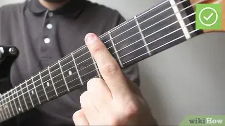 Image titled Play Barre Chords on a Guitar Step 1