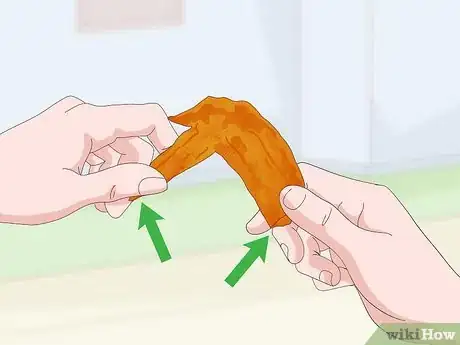 Image titled Eat Chicken Wings Step 9