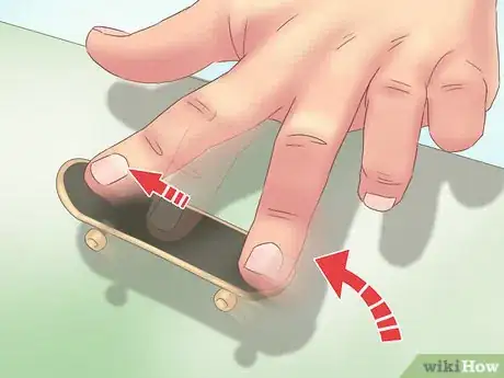 Image titled Kickflip on a Tech Deck Step 5