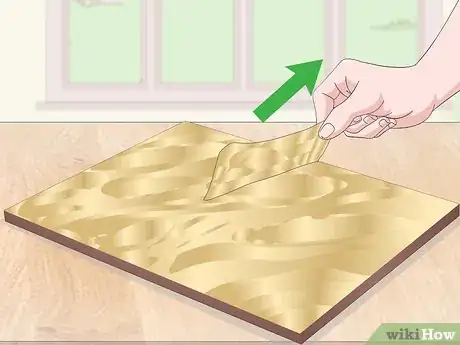 Image titled Apply Gold Leaf to Canvas Step 12