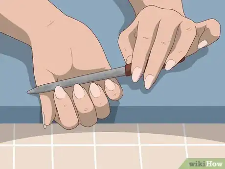 Image titled Play Guitar with Long Nails Step 4.jpeg