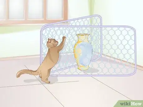 Image titled Get Your Cat to Stop Knocking Things Over Step 2