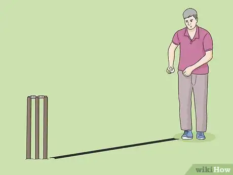 Image titled Grip the Ball to Bowl Offspin Step 6