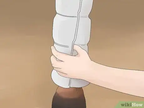 Image titled Wrap a Horse's Leg Step 17