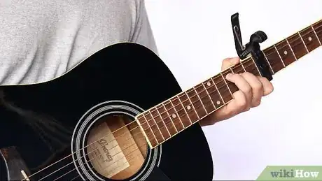Image titled Capo a Fret on an Acoustic Guitar Step 12