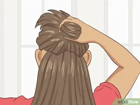 Image titled Curl Your Hair with Tongs Step 9.jpeg