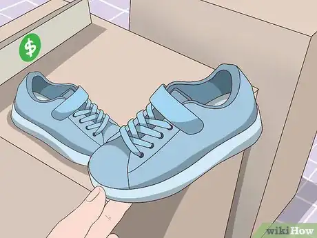 Image titled Put Shoes on a Baby Step 1.jpeg