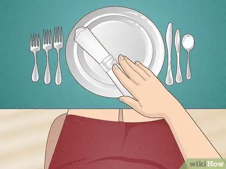 Image titled Use a Napkin with Proper Table Etiquette Step 1