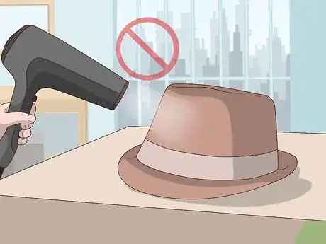 Image titled Practice Male Hat Etiquette Step 11.jpeg