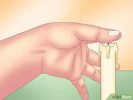 Image titled Put Out a Candle with Your Fingers Step 4