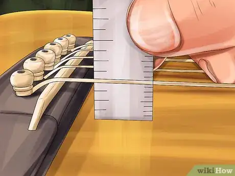 Image titled Lower the Action on an Acoustic Guitar Step 14