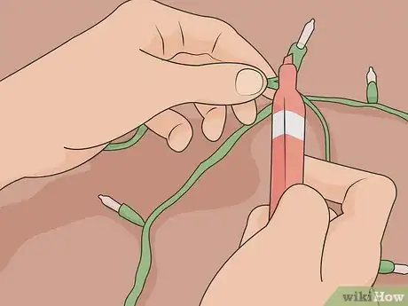Image titled Fix Christmas Lights That Are Half Out Step 03