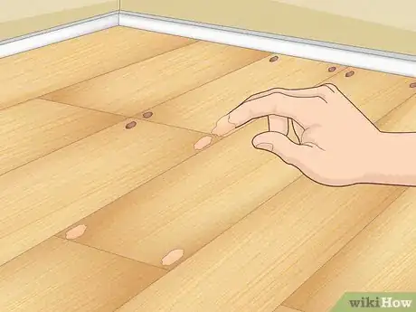 Image titled Fill Nail Holes in Hardwood Floors Step 9