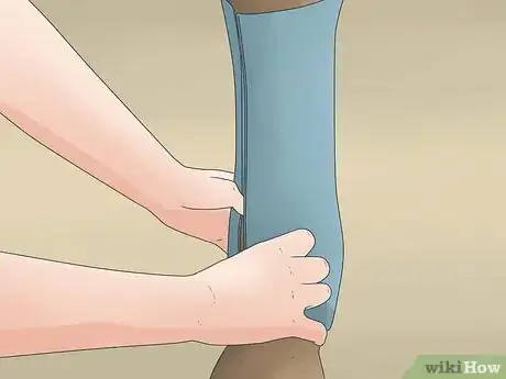 Image titled Wrap a Horse's Leg Step 10