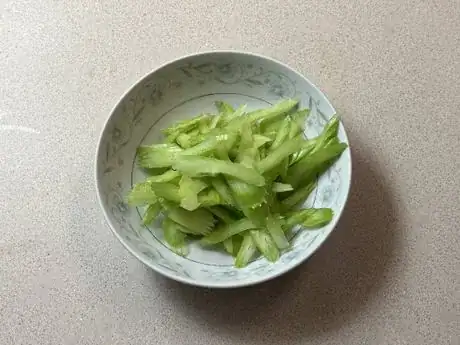 Image titled Cut_celery_into_thin_strips