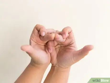 Image titled Do a Snake Hand Trick Step 9