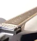 Remove Strings from an Electric Guitar