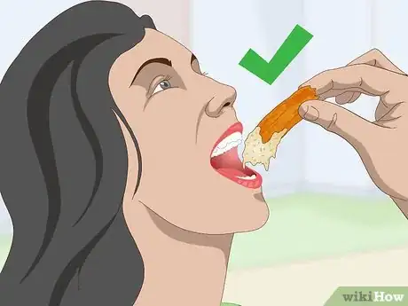 Image titled Eat Chicken Wings Step 8