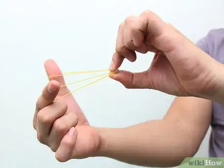 Image titled Make and Shoot Mini Paper Bullets with Rubber Bands Step 12