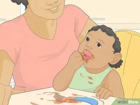 Image titled Get Your Toddler to Eat with Utensils Step 14