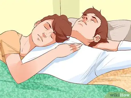 Image titled Avoid Trapping Your Arm While Snuggling in Bed Step 5