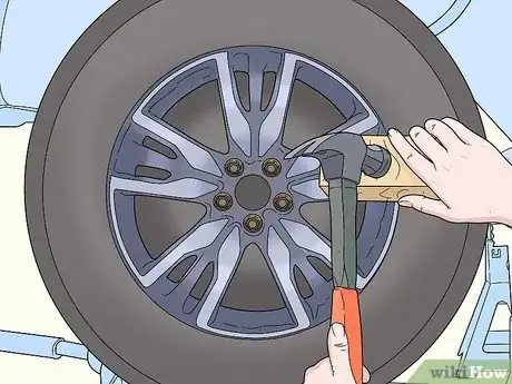 Image titled Remove a Stuck Wheel Step 3