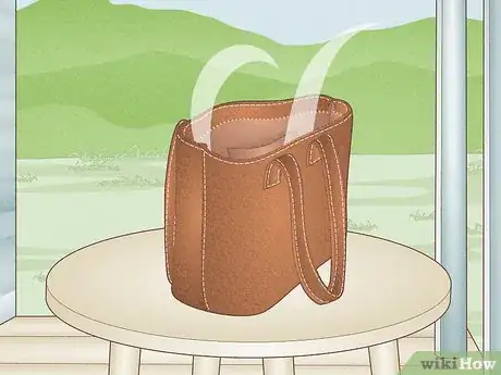Image titled Remove Smell from an Old Leather Bag Step 2