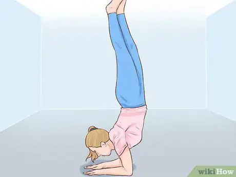 Image titled Do an Elbow Stand Step 4