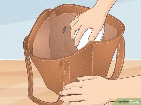 Image titled Remove Smell from an Old Leather Bag Step 1