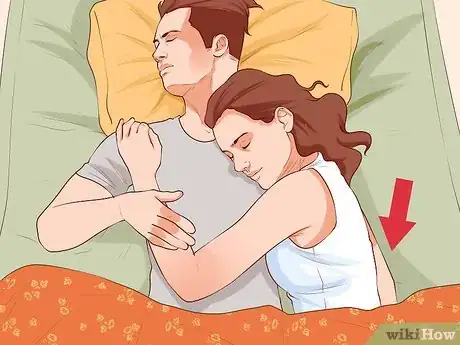 Image titled Avoid Trapping Your Arm While Snuggling in Bed Step 1