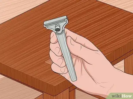 Image titled Clean Tape Adhesive from Wooden Furniture Step 3