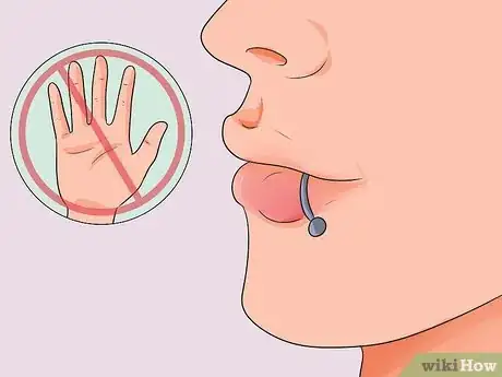 Imagen titulada Take Care of a Lip Piercing Step 12