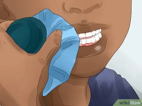 Imagen titulada Make a Loose Tooth Fall Out Without Pulling It Step 11