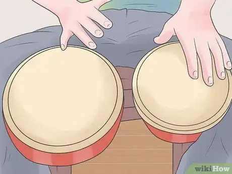 Imagen titulada Play the Bongos Step 16