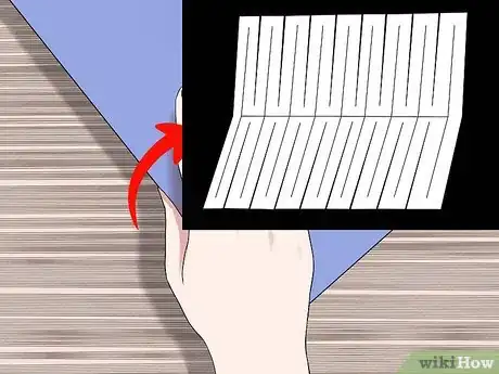 Imagen titulada Pass Your Body Through a Sheet of Paper Step 11