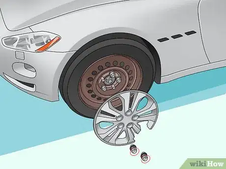 Imagen titulada Change a Hubcap Step 6