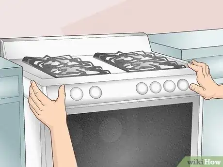 Imagen titulada Clean Underneath a Stove Step 15